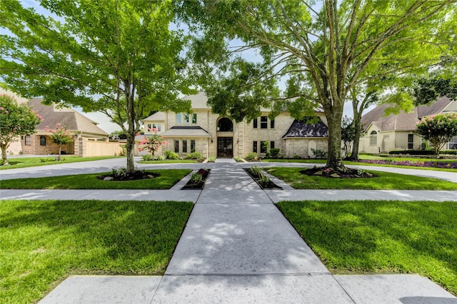 15817 Honolulu St, Jersey Village, TX 77040 - view of front of home featuring a front yard and a residential view