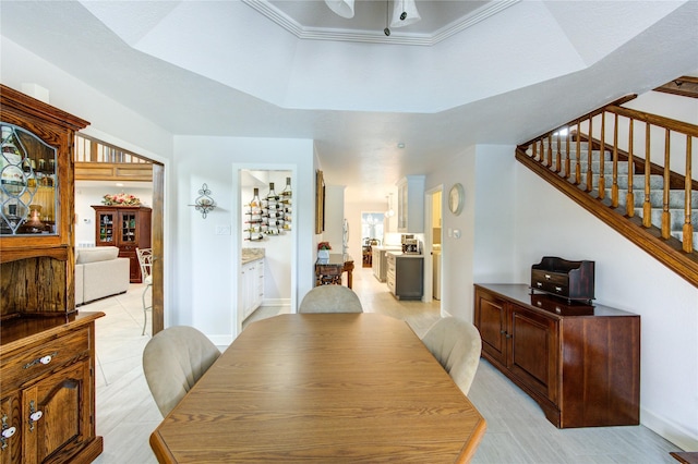 15817 Honolulu St, Jersey Village, TX 77040 - dining room with stairs, ceiling fan, and a tray ceiling