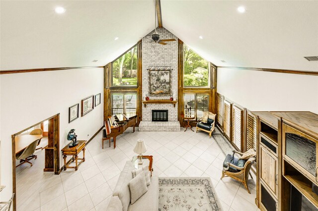 15817 Honolulu St, Jersey Village, TX 77040 - living area featuring a brick fireplace, a ceiling fan, light tile patterned floors, high vaulted ceiling, and beam ceiling