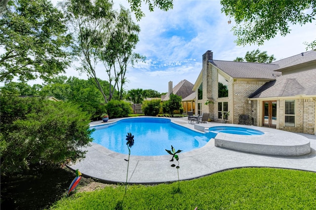 15817 Honolulu St, Jersey Village, TX 77040 - view of swimming pool with a patio, a fenced backyard, and a pool with connected hot tub