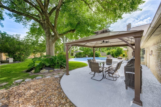 15817 Honolulu St, Jersey Village, TX 77040 - fenced backyard featuring a gazebo, an outdoor pool, a patio area, and outdoor dining area