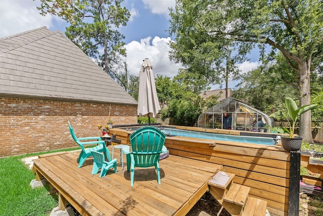 1526 Sweet Grass Trl, Houston, TX 77090 - deck featuring an outdoor pool