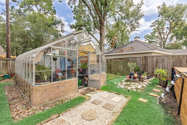 1526 Sweet Grass Trl, Houston, TX 77090 - fenced backyard featuring an exterior structure and an outdoor structure