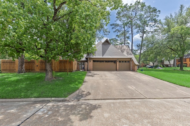 1526 Sweet Grass Trl, Houston, TX 77090 - view of front facade featuring an attached garage, brick siding, and concrete driveway