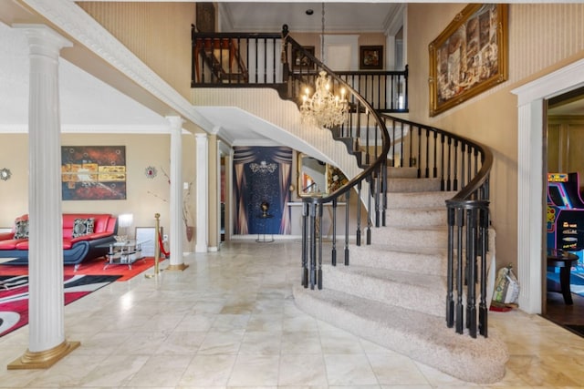 1526 Sweet Grass Trl, Houston, TX 77090 - foyer entrance with ornate columns, stairway, ornamental molding, a chandelier, and marble look tiles