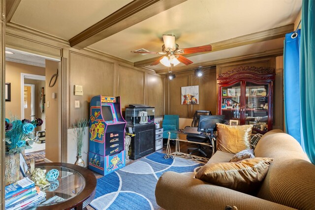 1526 Sweet Grass Trl, Houston, TX 77090 - living room with crown molding, ceiling fan, a desk, beamed ceiling, and a decorative wall