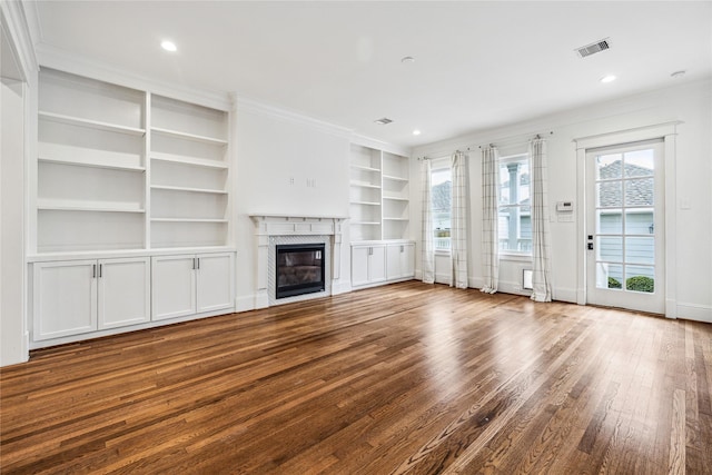 727 Tulane St, Houston, TX 77007 - unfurnished living room with dark wood finished floors, a premium fireplace, built in features, ornamental molding, and recessed lighting