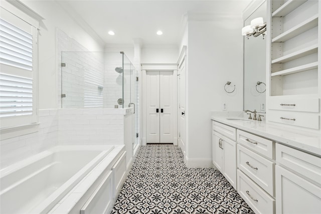 727 Tulane St, Houston, TX 77007 - full bath featuring a shower stall, a bath, double vanity, crown molding, and recessed lighting