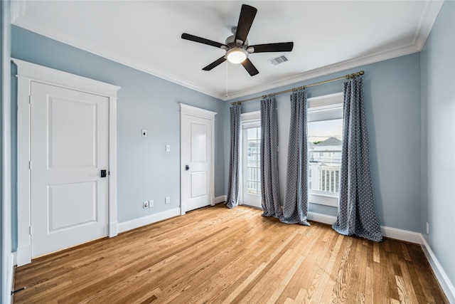 727 Tulane St, Houston, TX 77007 - unfurnished room with light wood-type flooring, a ceiling fan, and ornamental molding