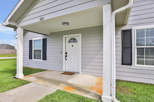 605 Waco St, Dayton, TX 77535 - property entrance with a yard