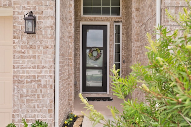 24526 Bluestar Blossom Trl, Katy, TX 77493 - doorway to property with brick siding
