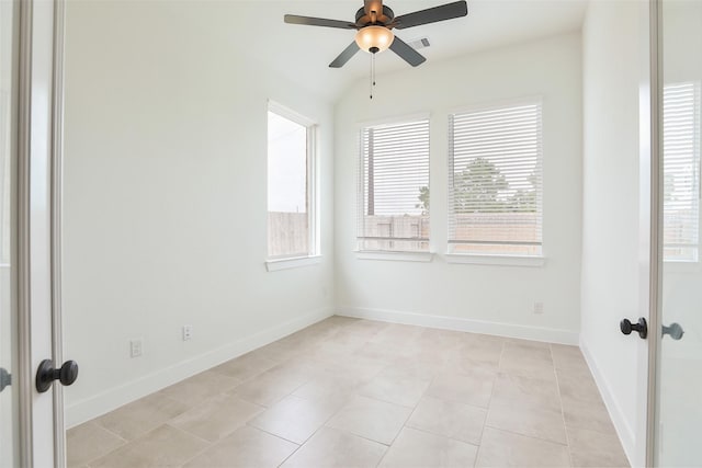 24526 Bluestar Blossom Trl, Katy, TX 77493 - empty room with french doors, a ceiling fan, and light tile patterned flooring