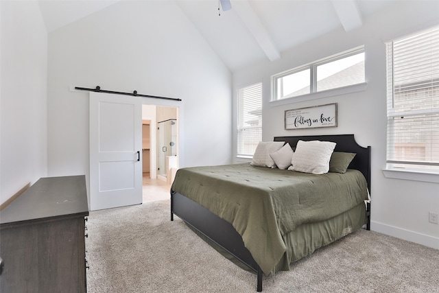 24526 Bluestar Blossom Trl, Katy, TX 77493 - bedroom with a barn door, light colored carpet, high vaulted ceiling, beam ceiling, and connected bathroom