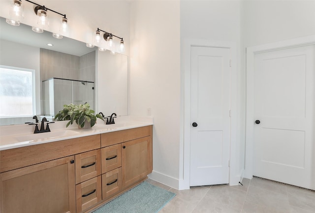 24526 Bluestar Blossom Trl, Katy, TX 77493 - full bath featuring a shower stall, double vanity, and tile patterned floors