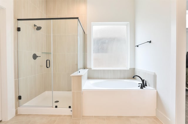 24526 Bluestar Blossom Trl, Katy, TX 77493 - full bathroom featuring a garden tub, a stall shower, and tile patterned flooring