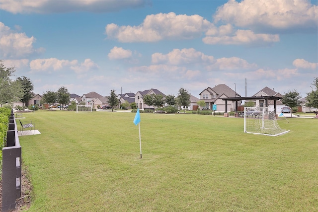 24526 Bluestar Blossom Trl, Katy, TX 77493 - view of home's community featuring an area for sports and a residential view