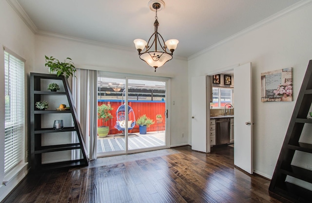 11711 Memorial Dr Unit 635, Houston, TX 77024 - unfurnished dining area with ornamental molding, dark wood-type flooring, and a chandelier