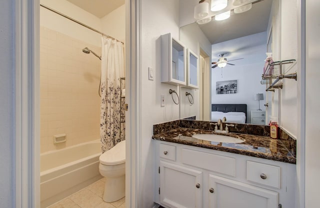 11711 Memorial Dr Unit 635, Houston, TX 77024 - bathroom featuring tile patterned floors, vanity, shower / tub combo, connected bathroom, and a ceiling fan