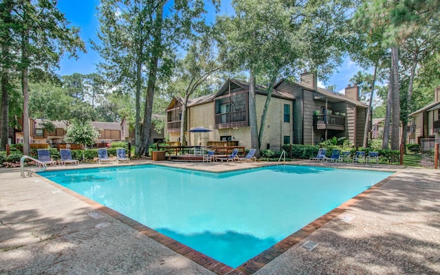 11711 Memorial Dr Unit 635, Houston, TX 77024 - community pool with a patio