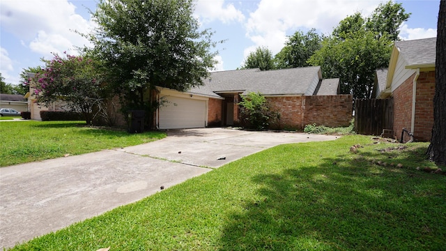 6303 Greenway Forest Ln, Houston, TX 77088 - view of front of house featuring brick siding, driveway, an attached garage, and a shingled roof