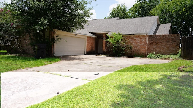 6303 Greenway Forest Ln, Houston, TX 77088 - view of front of property featuring brick siding, driveway, an attached garage, and roof with shingles