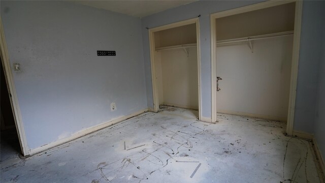 6303 Greenway Forest Ln, Houston, TX 77088 - unfurnished bedroom featuring multiple closets