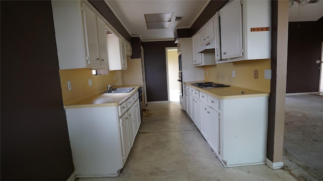 6303 Greenway Forest Ln, Houston, TX 77088 - kitchen featuring black gas cooktop, white cabinetry, light countertops, and crown molding