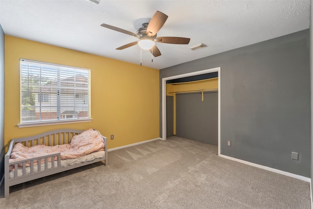 902 Mulberry Ridge Way, Houston, TX 77062 - carpeted bedroom with a closet and ceiling fan