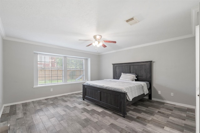 902 Mulberry Ridge Way, Houston, TX 77062 - bedroom featuring light wood-type flooring, crown molding, and a ceiling fan