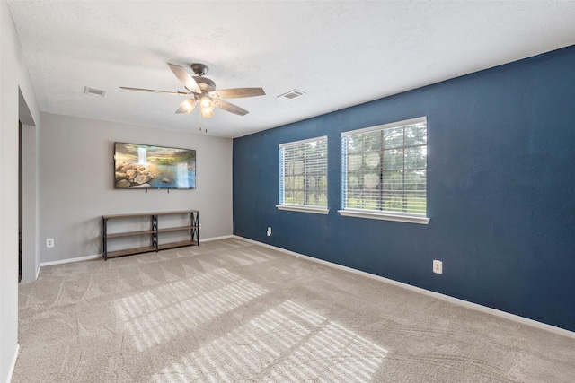 902 Mulberry Ridge Way, Houston, TX 77062 - carpeted empty room with a ceiling fan and a textured ceiling