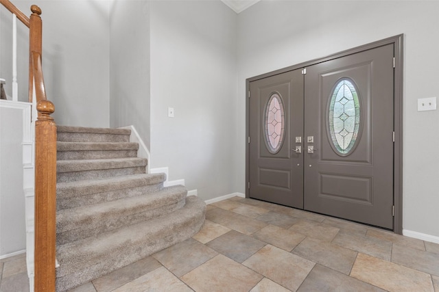 902 Mulberry Ridge Way, Houston, TX 77062 - entrance foyer with stairway, a high ceiling, and light stone finish floors
