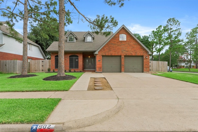 902 Mulberry Ridge Way, Houston, TX 77062 - traditional-style house with brick siding, driveway, roof with shingles, and a garage
