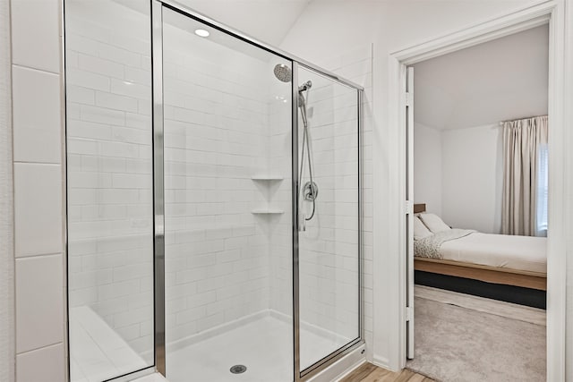 19911 Paros Island Dr, Hockley, TX 77447 - ensuite bathroom with a shower stall and wood finished floors