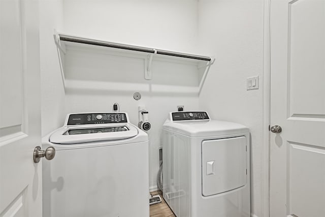 19911 Paros Island Dr, Hockley, TX 77447 - laundry room with washing machine and dryer
