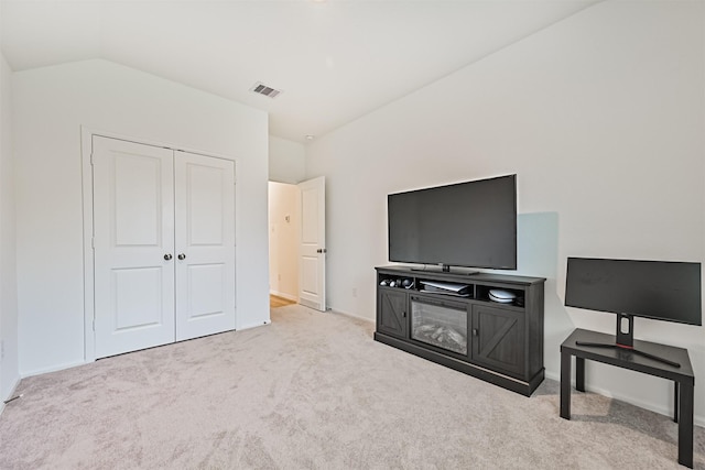 19911 Paros Island Dr, Hockley, TX 77447 - unfurnished bedroom with carpet floors, vaulted ceiling, and a closet