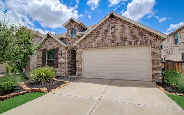 15023 Eves Necklace Ct, Cypress, TX 77433 - view of front of property with brick siding, concrete driveway, and an attached garage