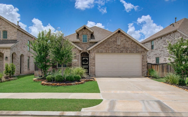 15023 Eves Necklace Ct, Cypress, TX 77433 - view of front of house featuring brick siding, concrete driveway, a garage, and a shingled roof