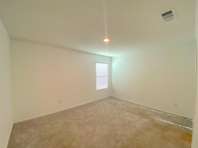 21015 Longeni Dr, New Caney, TX 77357 - unfurnished room with carpet flooring and baseboards