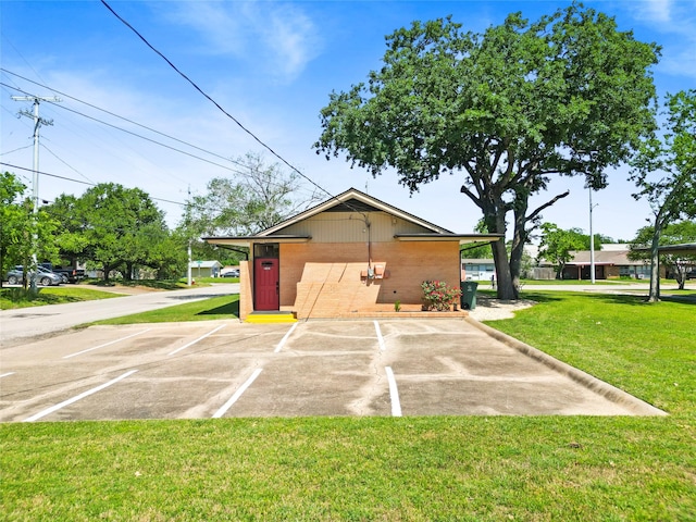 601 Mary Lake Dr, Bryan, TX 77801 - view of outdoor structure with uncovered parking