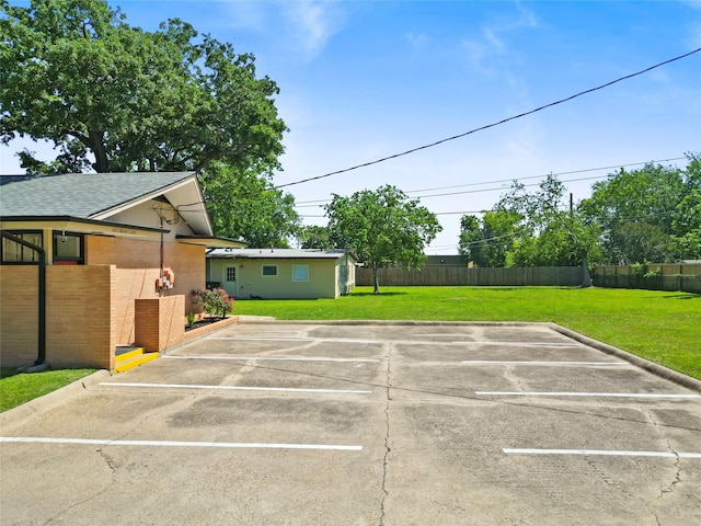 601 Mary Lake Dr, Bryan, TX 77801 - view of uncovered parking lot