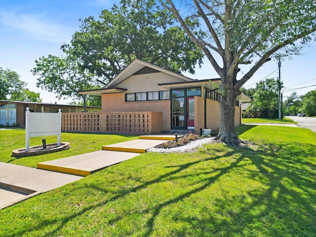 601 Mary Lake Dr, Bryan, TX 77801 - view of front of house featuring brick siding