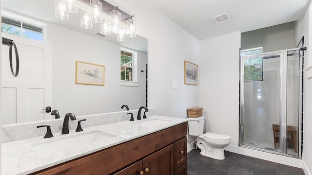 27938 Deer Run St, Montgomery, TX 77356 - bathroom featuring double vanity, plenty of natural light, and a shower stall
