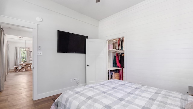 27938 Deer Run St, Montgomery, TX 77356 - bedroom with wood finished floors, a spacious closet, and a closet