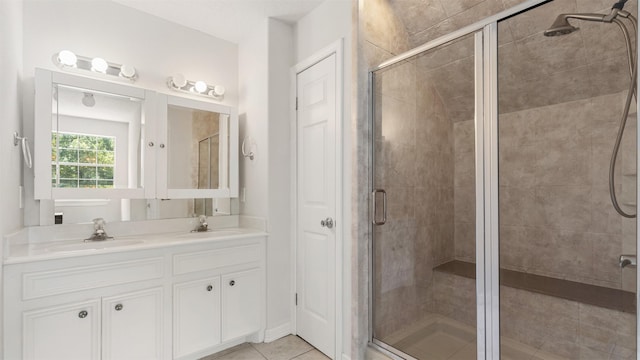 27938 Deer Run St, Montgomery, TX 77356 - bathroom with a shower stall, double vanity, and tile patterned floors