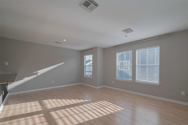 1101 Saulnier St, Houston, TX 77019 - unfurnished room featuring light wood-style floors and recessed lighting