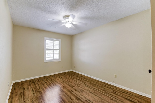 14436 Misty Meadow Ln, Houston, TX 77079 - empty room featuring wood finished floors, a ceiling fan, and a textured ceiling