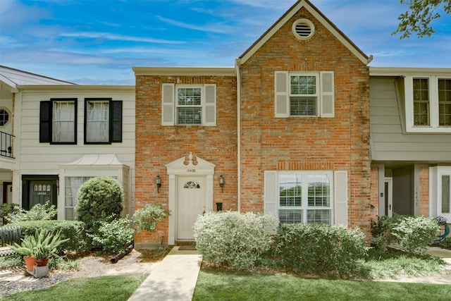 14436 Misty Meadow Ln, Houston, TX 77079 - townhome / multi-family property featuring brick siding