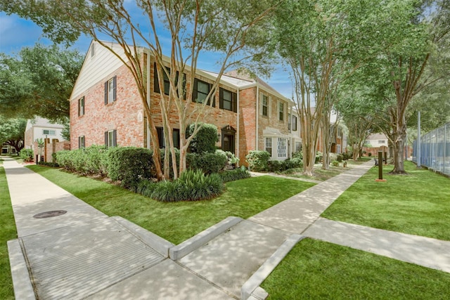 14436 Misty Meadow Ln, Houston, TX 77079 - view of front of property featuring brick siding and a residential view