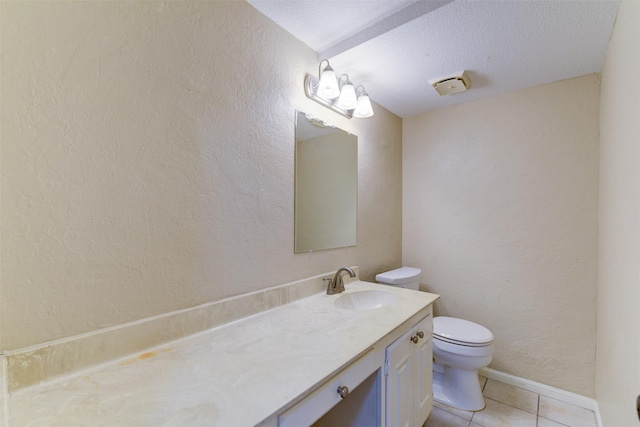 14436 Misty Meadow Ln, Houston, TX 77079 - bathroom featuring vanity, a textured wall, tile patterned floors, and a textured ceiling