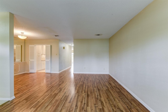 14436 Misty Meadow Ln, Houston, TX 77079 - empty room with wood finished floors and baseboards